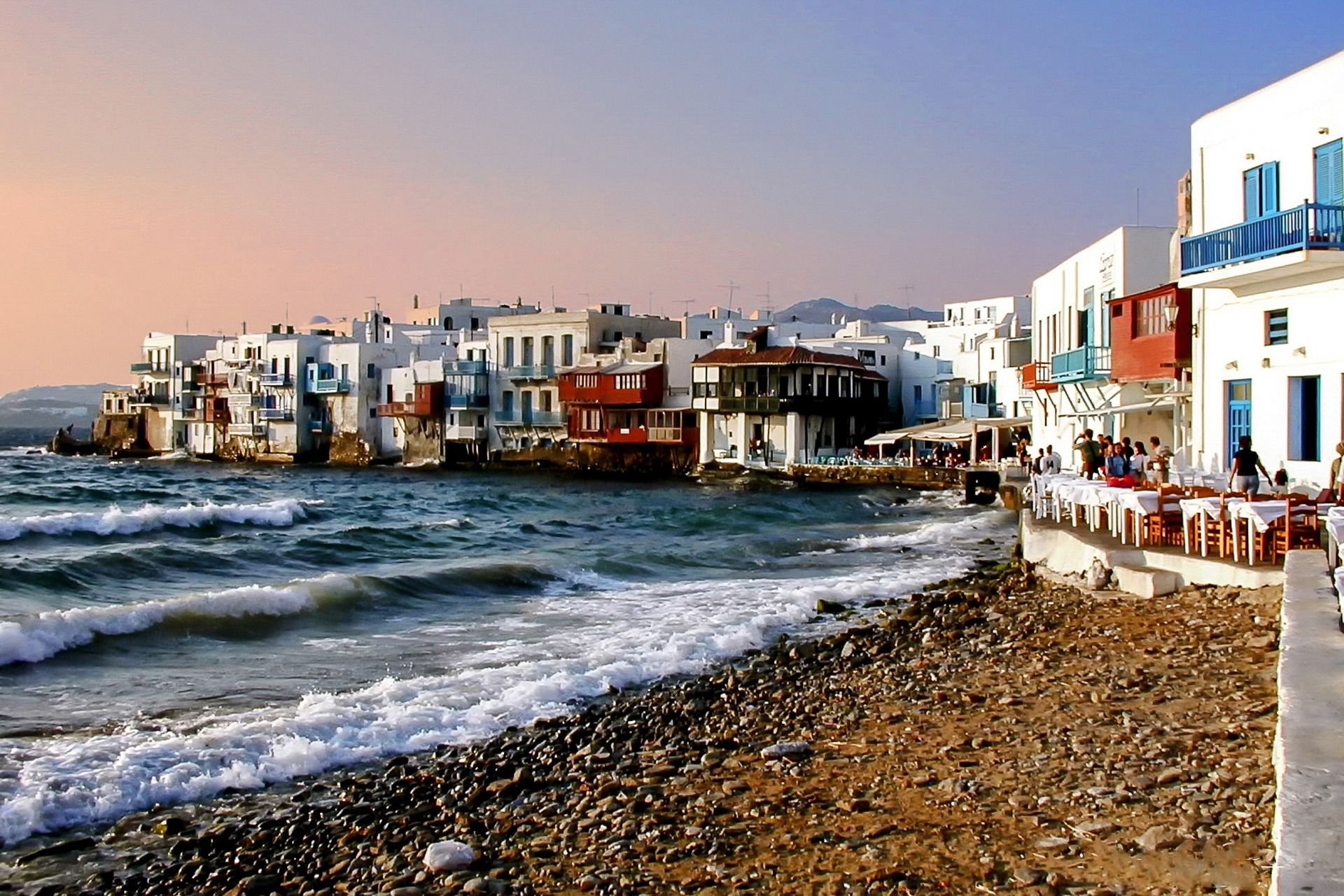 The Greek island of Mykonos is popular with American travelers this summer