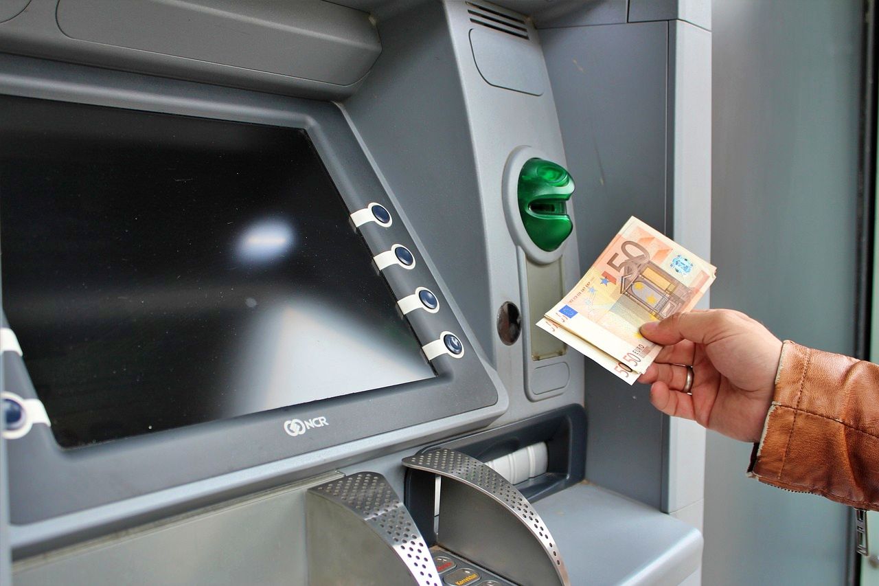 Drawing cash at an ATM in Europe