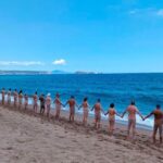 717 nudists formed a human chain on a Tarragona Beach in Spain