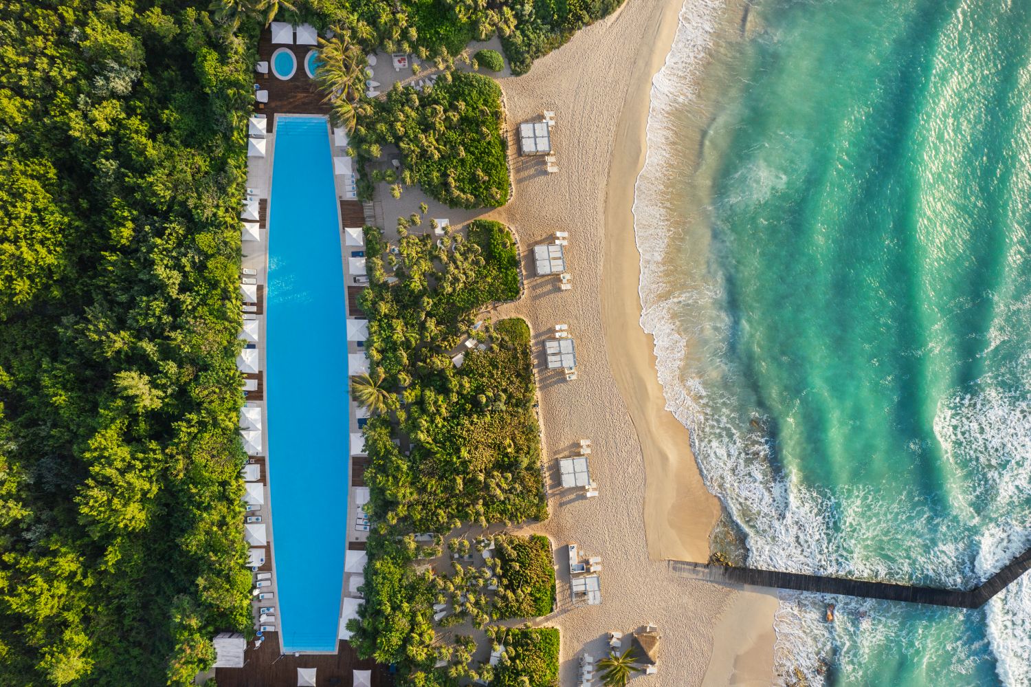 Pool and beach at VidantaWorld Riviera Maya